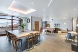 This stunning property boasts a spacious open-plan living area, perfect for entertaining and relaxation.