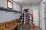 This ski storage room is perfect for storing all your winter gear.