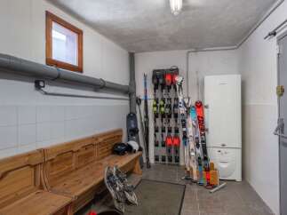 This ski storage room is perfect for storing all your winter gear.