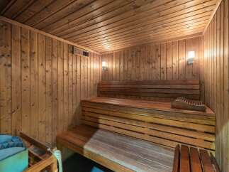 Step into relaxation with this inviting sauna.