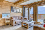 Experience the charm of this cozy living space, perfect for relaxing after a day of mountain adventures.