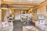 Experience the charm of this cozy chalet, featuring stunning wooden interiors and a warm, inviting atmosphere.