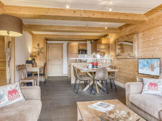Experience the charm of this cozy chalet, featuring stunning wooden interiors and a warm, inviting atmosphere.