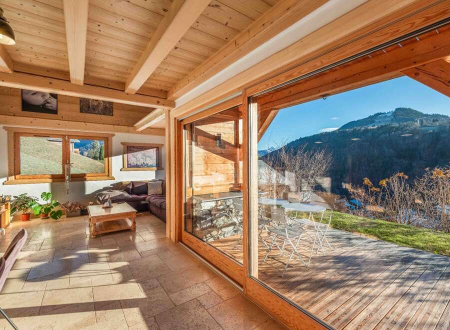 Experience the epitome of alpine living in this stunning property, boasting a seamless blend of indoor and outdoor spaces.
