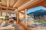 Experience the epitome of alpine living in this stunning property, boasting a seamless blend of indoor and outdoor spaces.