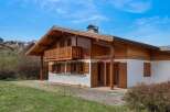 Discover the charm of this stunning wooden chalet, a perfect blend of rustic elegance and modern comfort.