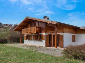 Discover the charm of this stunning wooden chalet, a perfect blend of rustic elegance and modern comfort.