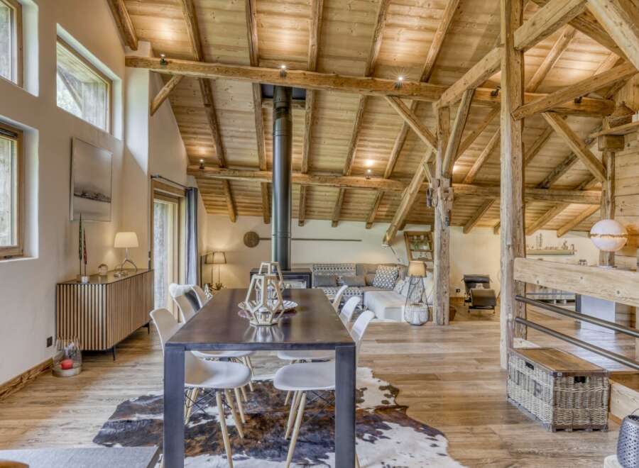 Experience rustic elegance in this stunning property, featuring exposed wooden beams and a cozy fireplace.