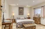 Discover the charm of this cozy bedroom, perfect for a relaxing retreat.
