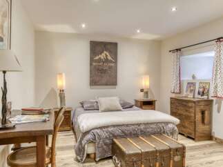 Discover the charm of this cozy bedroom, perfect for a relaxing retreat.