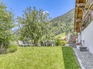 Escape to your own private oasis with this stunning property! Enjoy the tranquility of the lush green lawn, perfect for relaxation and outdoor activities.