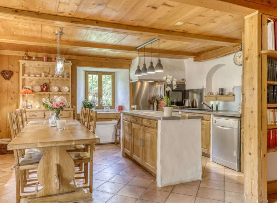 Step into a charming kitchen with rustic wooden elements and a warm, inviting atmosphere.
