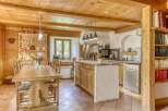 Step into a charming kitchen with rustic wooden elements and a warm, inviting atmosphere.