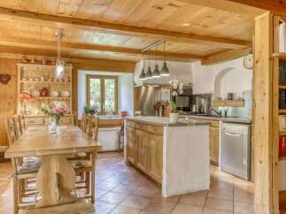 Step into a charming kitchen with rustic wooden elements and a warm, inviting atmosphere.