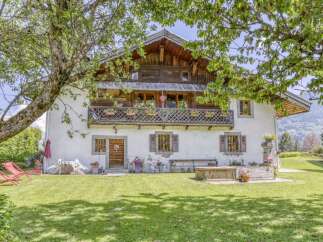 Charming alpine chalet nestled in a picturesque setting, perfect for a tranquil retreat.