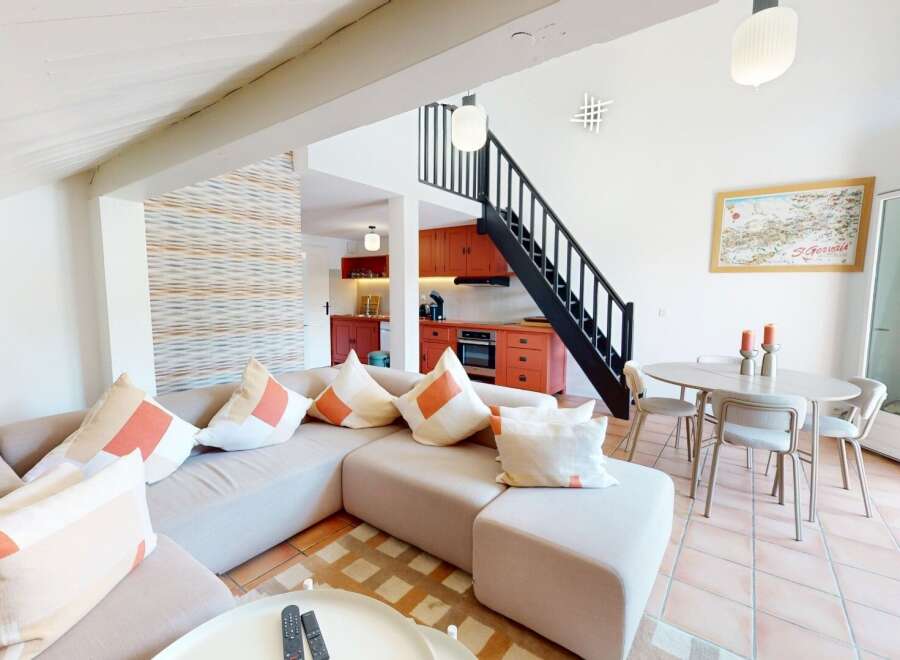 Discover this stunning property featuring a modern, open-plan living space.