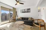 Step into this stylish living space, perfect for relaxation and entertaining.