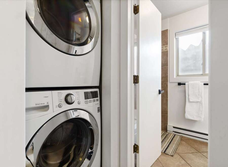 Discover the convenience of in-unit laundry with this stunning property! This home features a modern stacked washer and dryer, making laundry day a breeze.