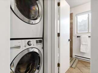 Discover the convenience of in-unit laundry with this stunning property! This home features a modern stacked washer and dryer, making laundry day a breeze.