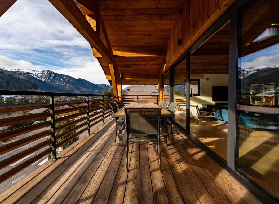 Enjoy breathtaking mountain views from this stunning balcony.