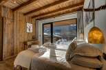 Experience rustic elegance in this stunning bedroom.