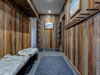 Step into a world of rustic elegance with this stunning entryway.