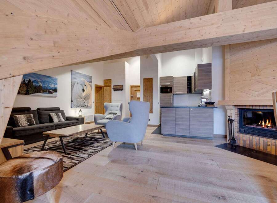 Experience the warmth of this stunning property, featuring a cozy fireplace and inviting living spaces.