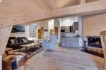 Experience the warmth of this stunning property, featuring a cozy fireplace and inviting living spaces.