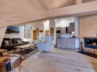 Experience the warmth of this stunning property, featuring a cozy fireplace and inviting living spaces.