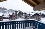 Experience the charm of mountain living in this stunning property, nestled amidst a picturesque winter wonderland.