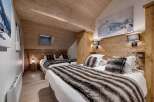 Experience the ultimate in alpine luxury with this stunning bedroom.