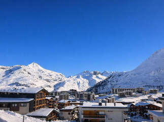 Discover your dream ski chalet in the heart of the Alps! This stunning property boasts breathtaking mountain views, perfect for enjoying the winter wonderland.