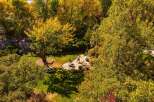 Enjoy the tranquility of this stunning property, surrounded by lush greenery and mature trees.
