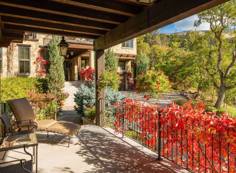 Step into luxury with this stunning property, showcasing a beautifully designed outdoor space.