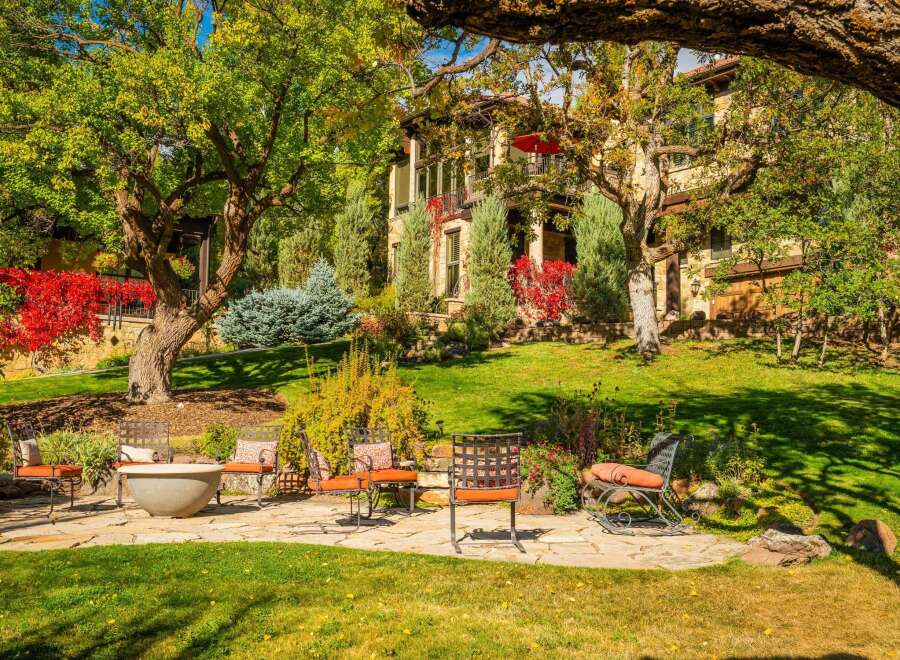 Experience luxury living in this stunning property with a beautifully landscaped yard.