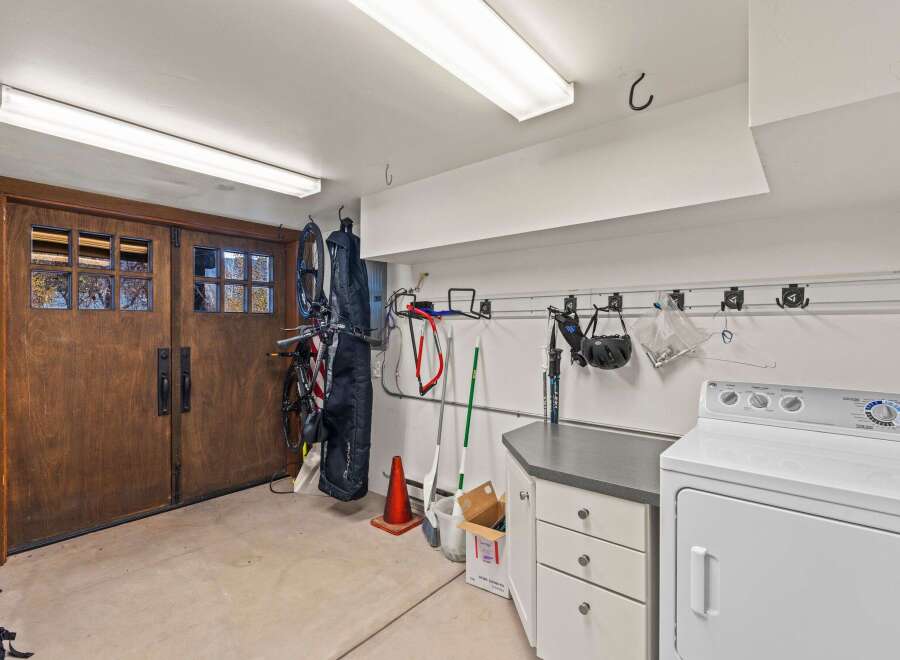 This property boasts a well-organized garage, perfect for storage and hobbies.