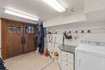 This property boasts a well-organized garage, perfect for storage and hobbies.