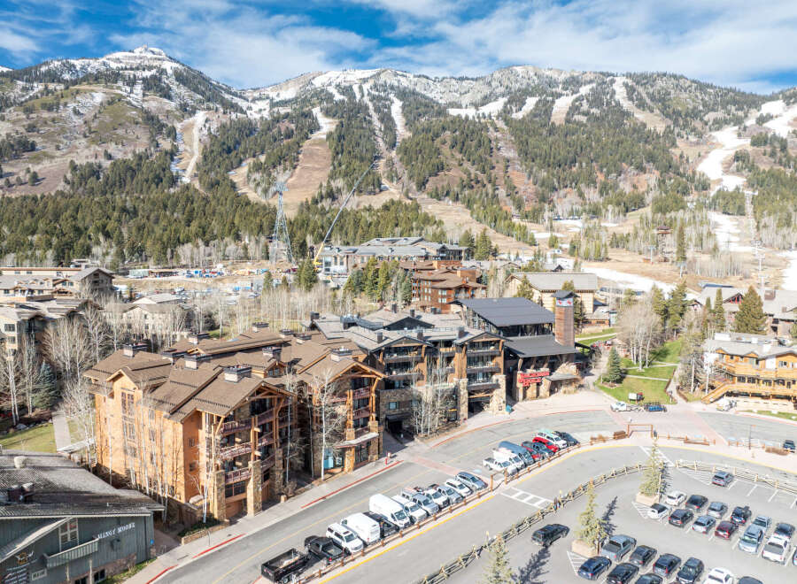Experience luxury living in this stunning mountain property, offering breathtaking views of the surrounding ski slopes.