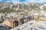 Experience luxury living in this stunning mountain property, offering breathtaking views of the surrounding ski slopes.