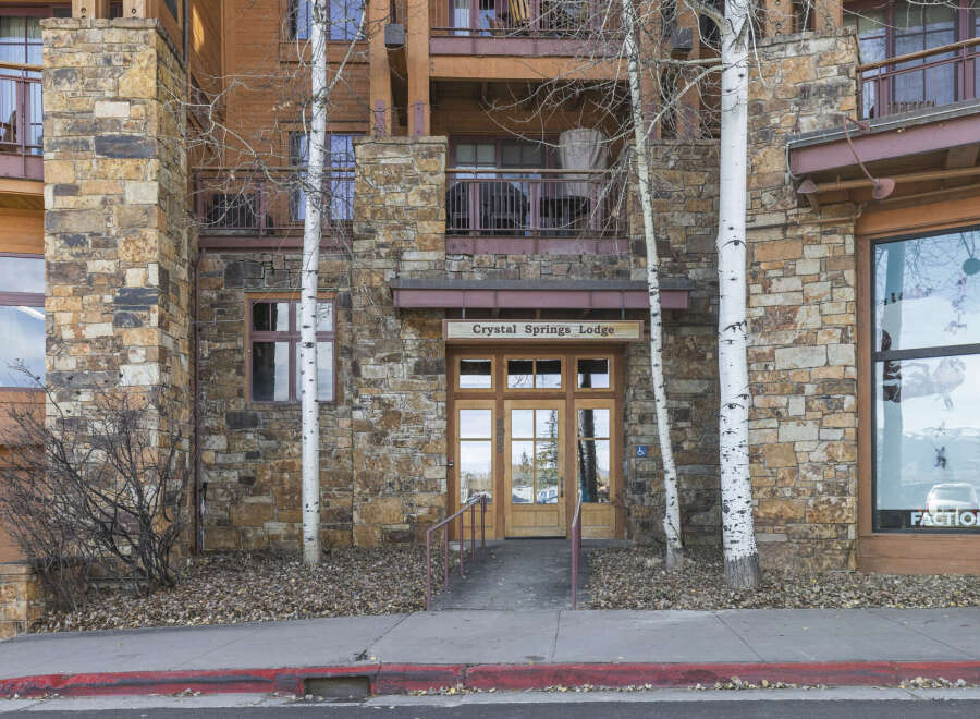 Crystal Springs Lodge offers a charming facade with its stone exterior and inviting entrance.