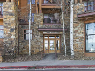Crystal Springs Lodge offers a charming facade with its stone exterior and inviting entrance.