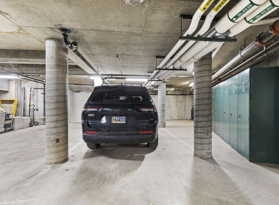 Explore the convenience of this property's secure, covered parking, perfect for protecting your vehicle from the elements.
