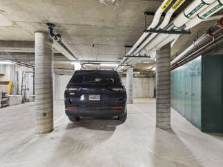 Explore the convenience of this property's secure, covered parking, perfect for protecting your vehicle from the elements.