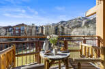 Enjoy breathtaking mountain views from this charming balcony.