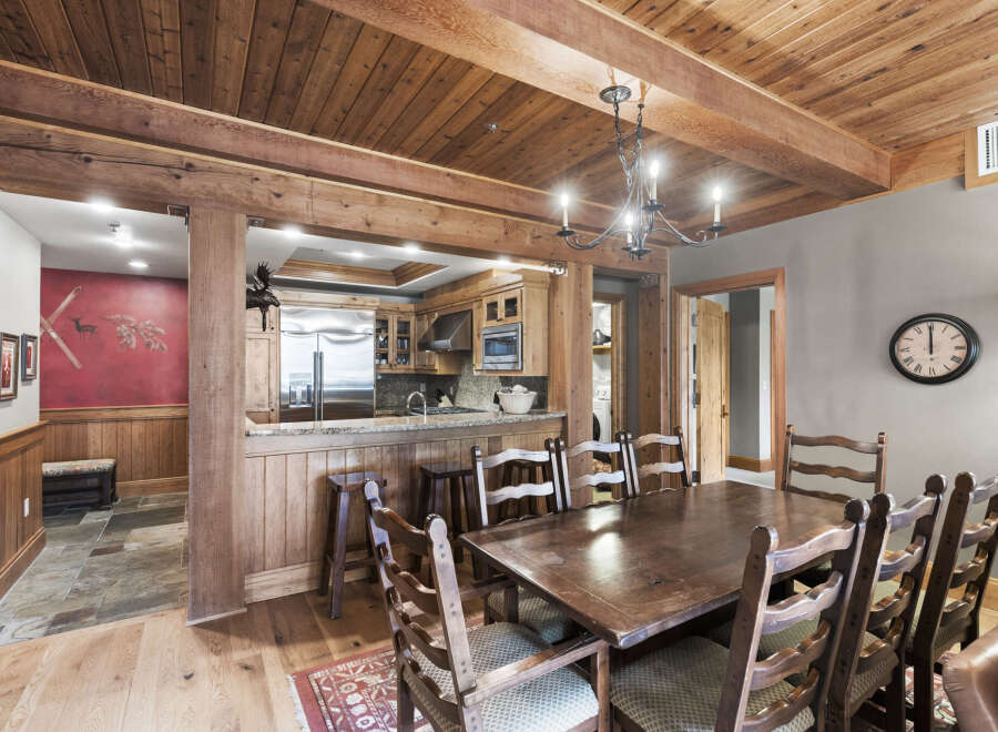 Step into a rustic dining room that exudes warmth and charm.
