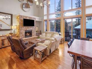 Experience luxury living in this stunning property featuring a cozy fireplace, perfect for chilly evenings.