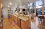This stunning property boasts a spacious open-concept kitchen with granite countertops and modern appliances, perfect for culinary enthusiasts.