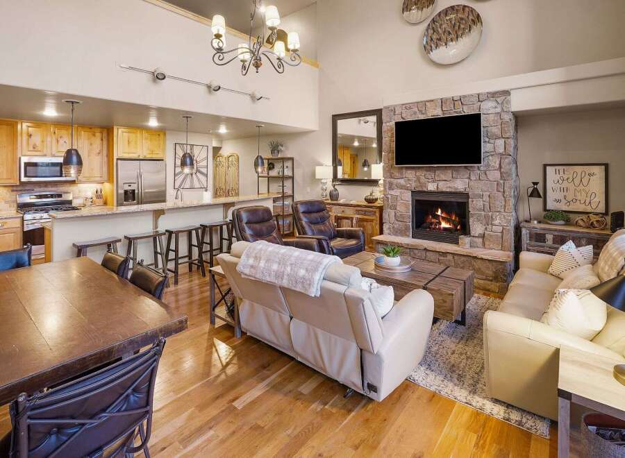 Step into luxury with this stunning property featuring a cozy fireplace, perfect for those chilly evenings.