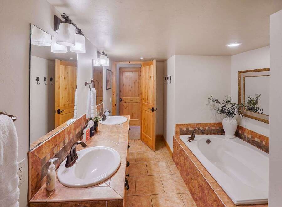 Step into a luxurious bathroom with a spa-like ambiance.