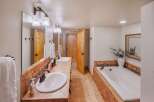 Step into a luxurious bathroom with a spa-like ambiance.